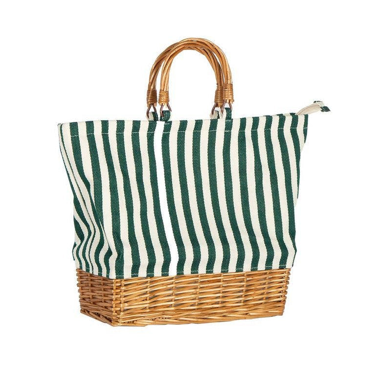 Green and white striped tote bag with wicker handle and base on a white background